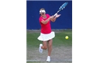 BIRMINGHAM, ENGLAND - JUNE 12:  Kirsten Flipkens of Belgium hits a return during Day Four of the Aegon Classic at Edgbaston Priory Club on June 12, 2014 in Birmingham, England.  (Photo by Paul Thomas/Getty Images)